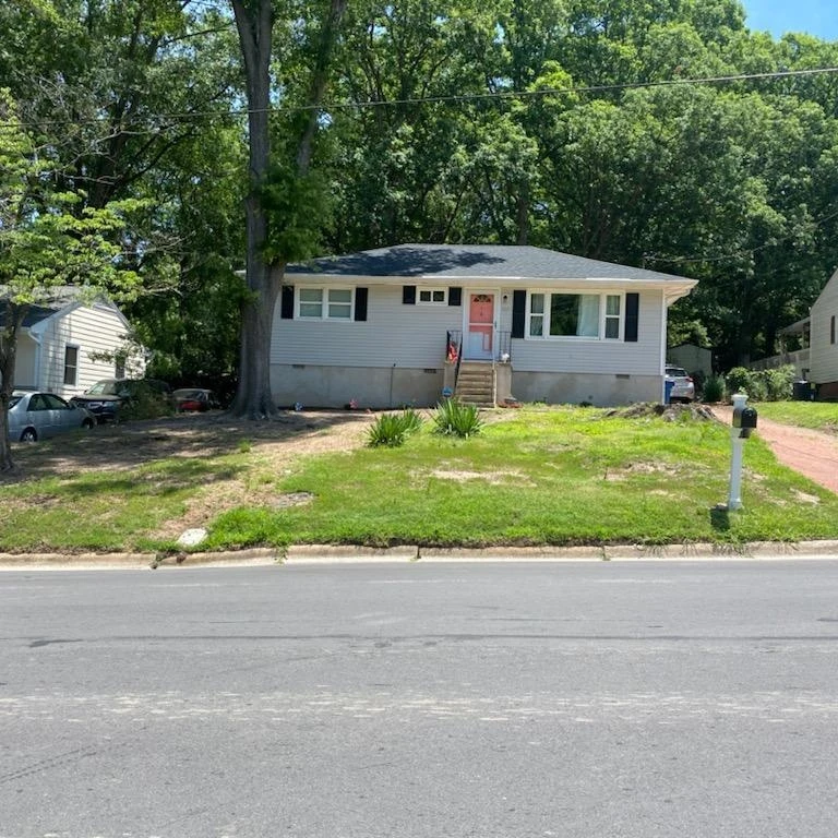 Raised stone sitting area with boulder seating